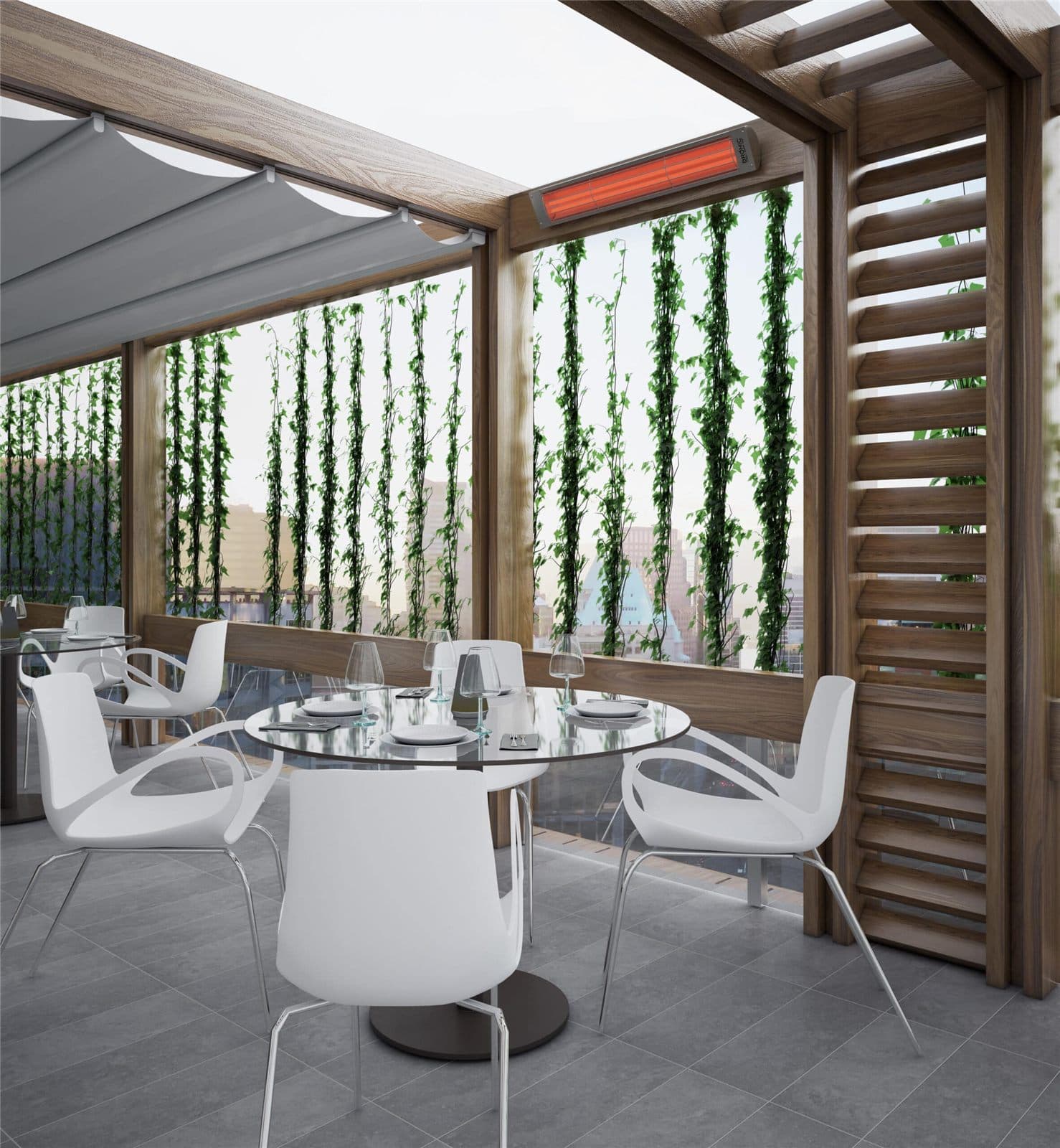 Bromic Cobalt electric heater glowing on a covered rooftop terrace