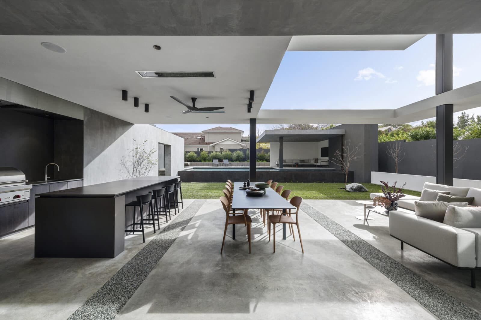 Bromic Platinum Electric heaters recessed into the ceiling of a modern covered patio