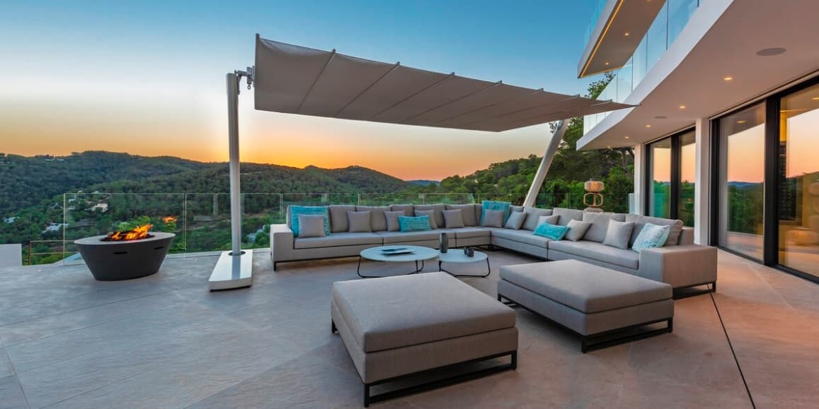 Commercial cantilever parasols over an outdoor dining terrace