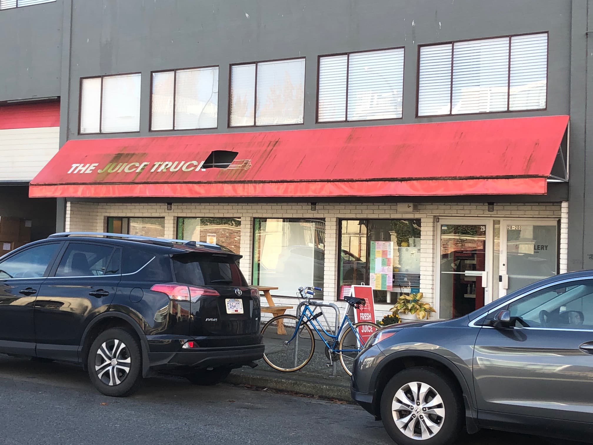 Damaged commercial awning before fabric replacement, Vancouver