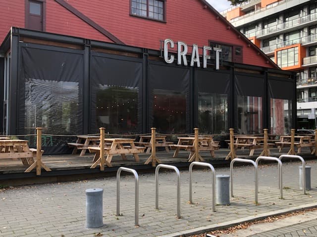 Covered commercial patio at Craft Beer Market in Olympic Village, Vancouver