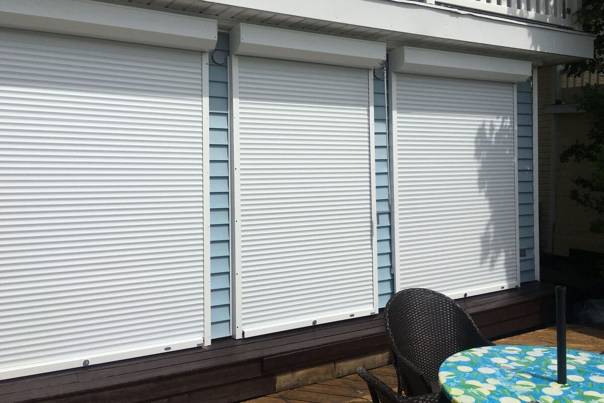 Rolling security shutters fitted over residential windows