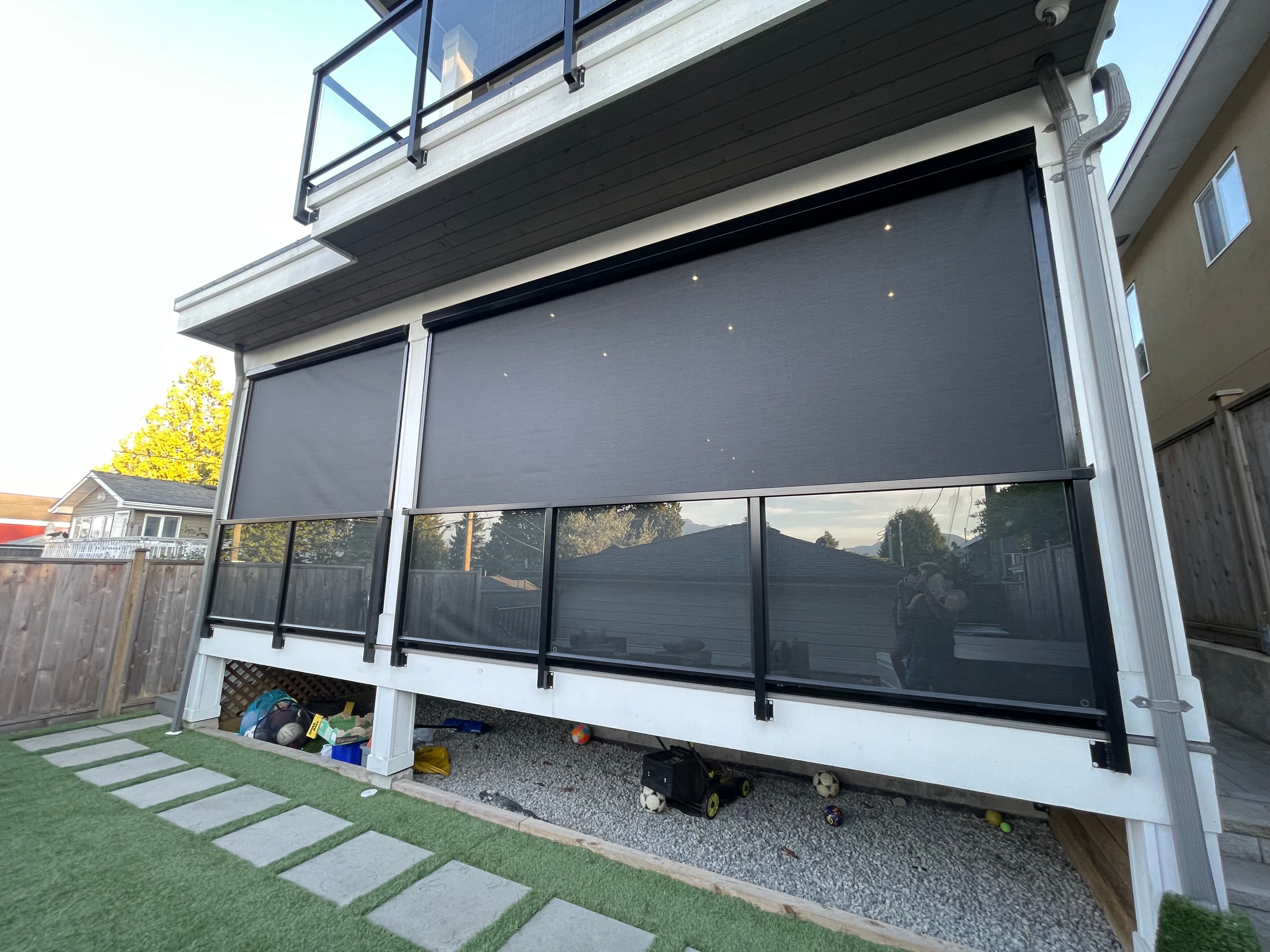 Zip track exterior shade screen installed on residential patio