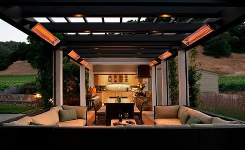 Bromic heaters integrated into a louvered roof pergola