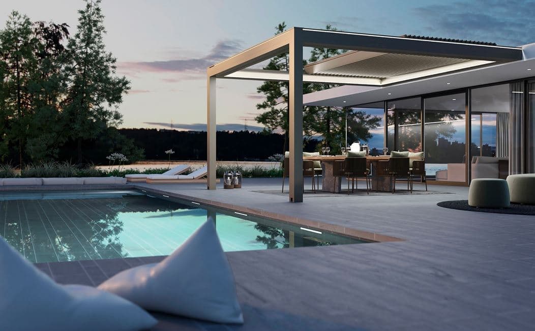 KE retractable louvered roof pergola over a poolside dining area