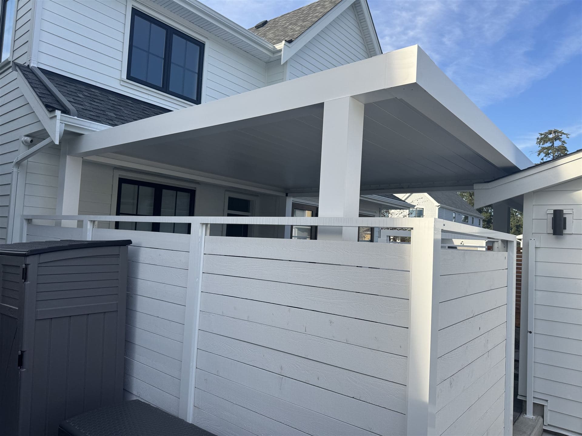 Aluminum louvered pergola over a residential patio