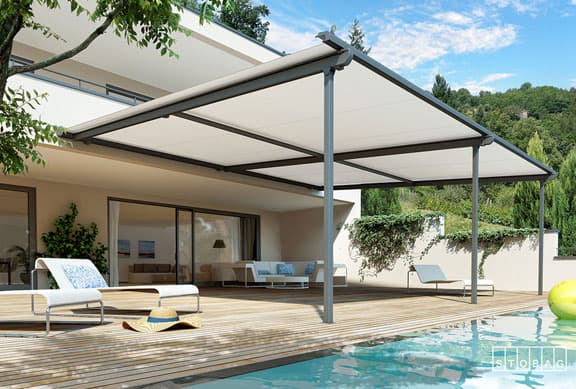 Pergola-mounted retractable fabric awning over large patio