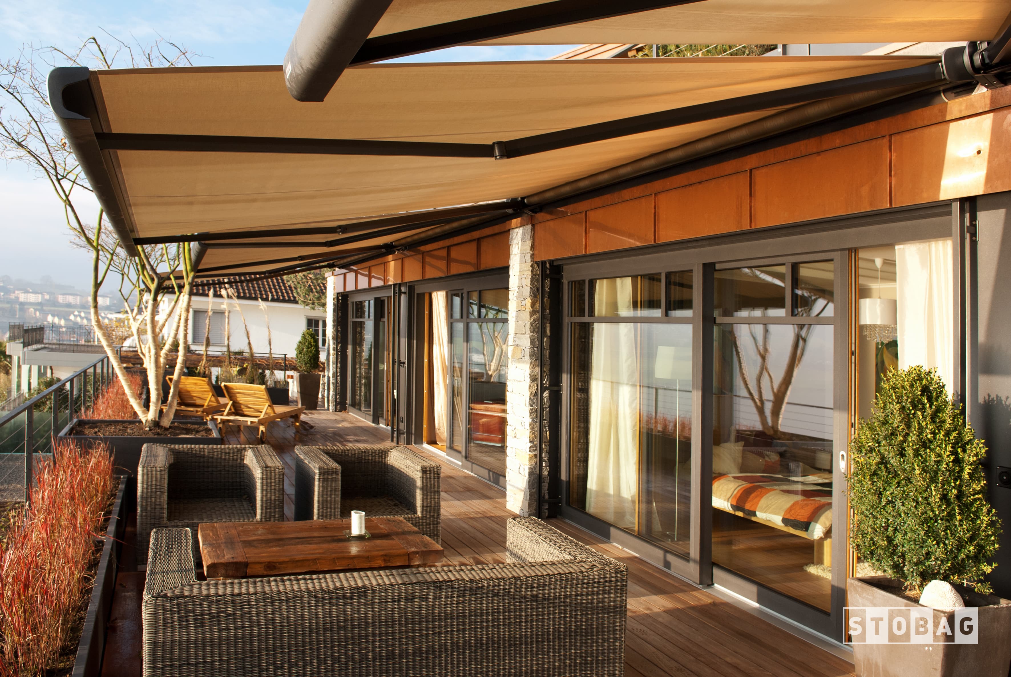 Cassette awning mounted above a deck at second storey height