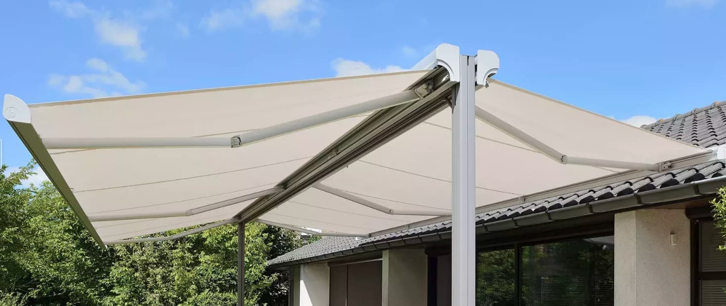 Freestanding retractable awning extended over a terrace